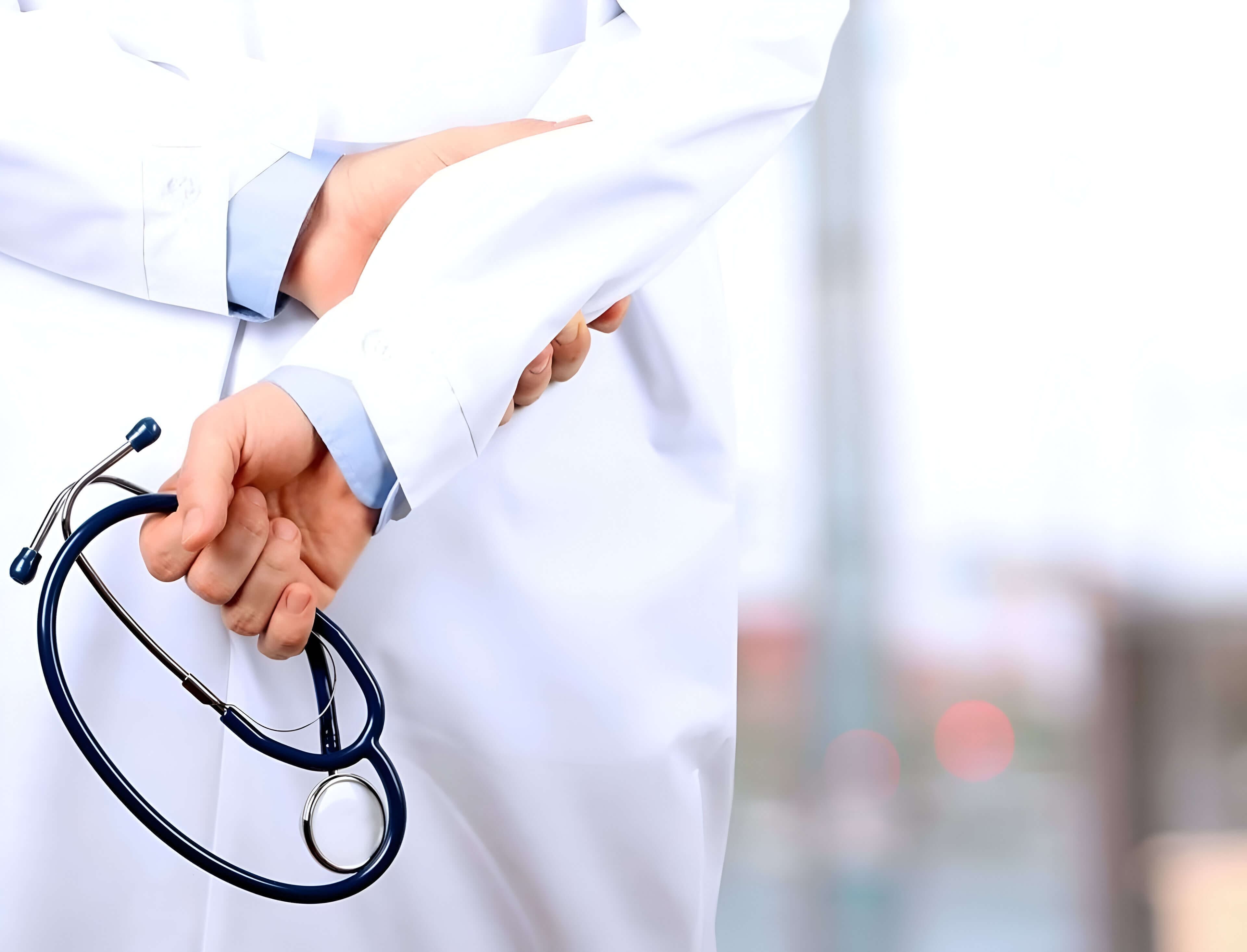 A person holding a stethoscope in their hands.